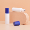 Круглая бутылочка с кремом для глаз небольшого размера с роликовым шариком